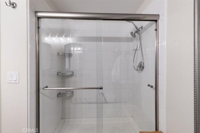 bathroom with an enclosed shower