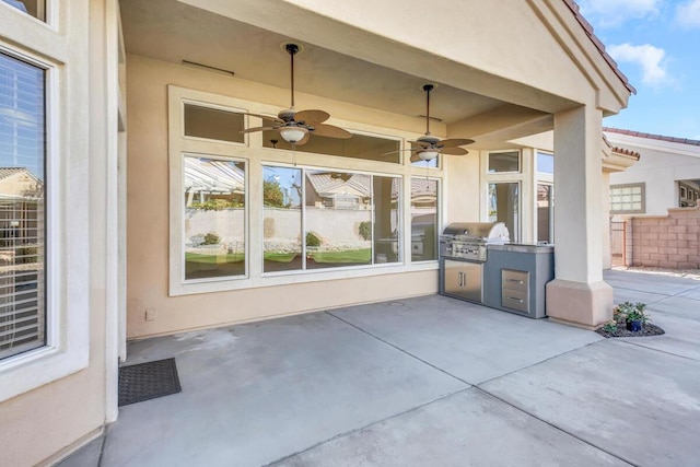 view of patio / terrace featuring a grill, ceiling fan, and area for grilling