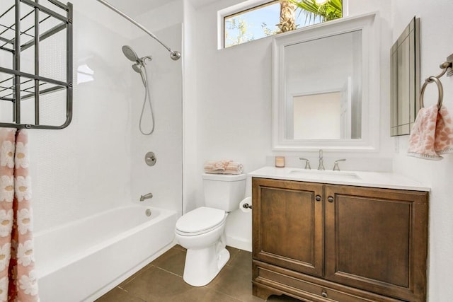 full bathroom featuring tile patterned flooring, vanity, toilet, and shower / bathtub combination with curtain