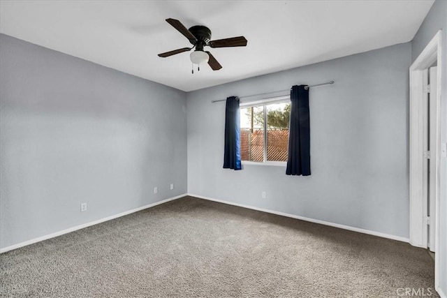 unfurnished room featuring carpet floors and ceiling fan