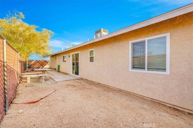 rear view of property featuring a patio area