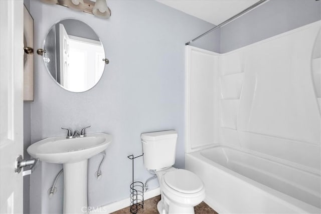 full bathroom with toilet, bathtub / shower combination, and sink