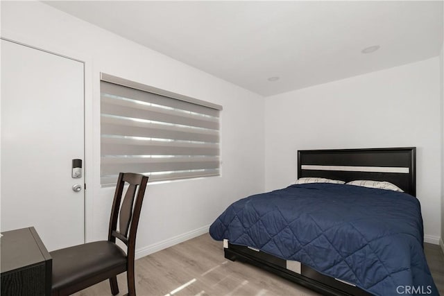 bedroom featuring light hardwood / wood-style flooring