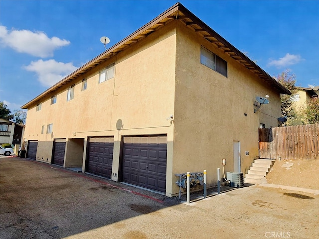 view of home's exterior with a garage