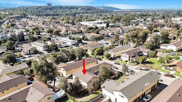 drone / aerial view featuring a mountain view