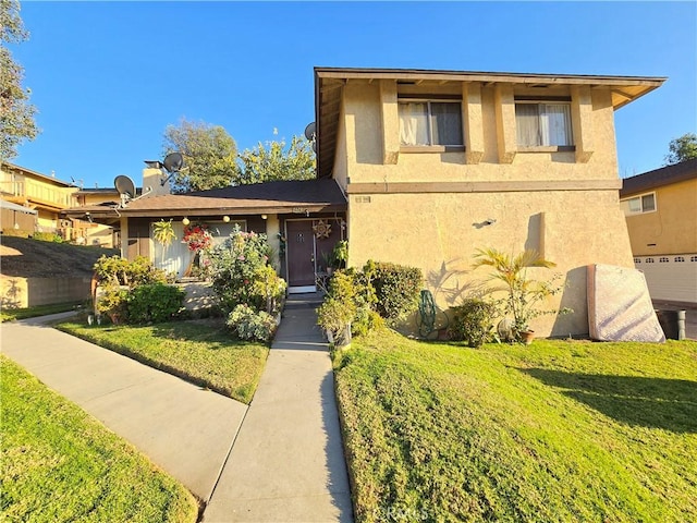 view of front of home with a front yard