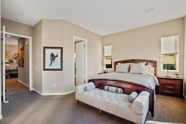 bedroom featuring dark wood-type flooring