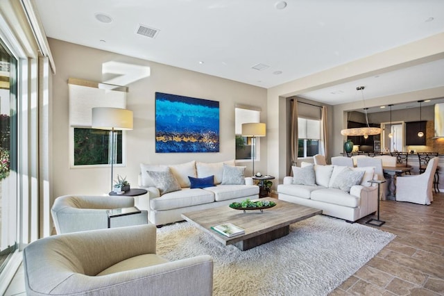 living room featuring a wealth of natural light