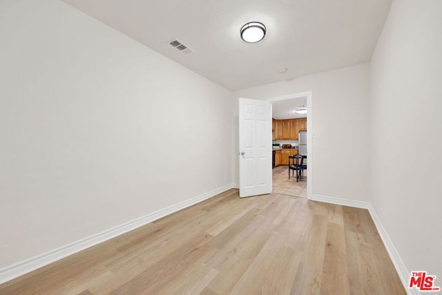 empty room featuring light wood-type flooring