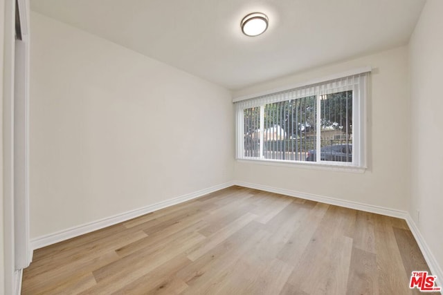 empty room featuring light hardwood / wood-style floors