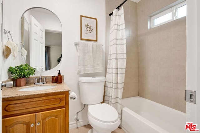 full bathroom featuring vanity, toilet, and shower / bath combo