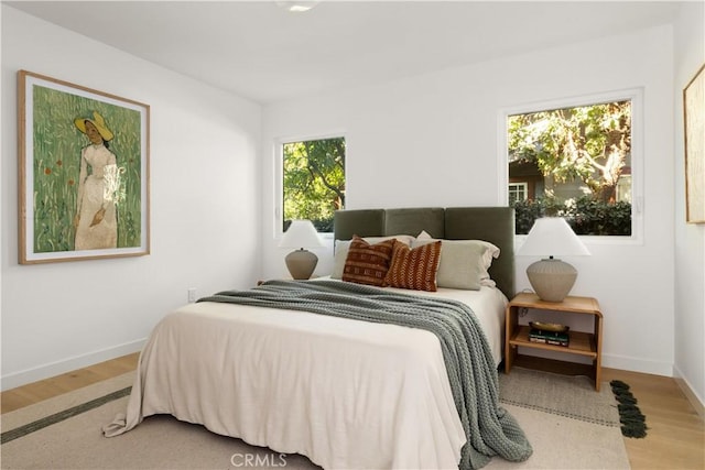 bedroom featuring light hardwood / wood-style floors