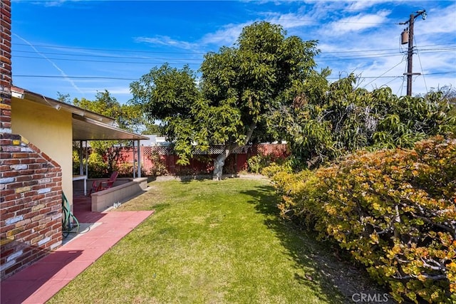 view of yard with a patio area