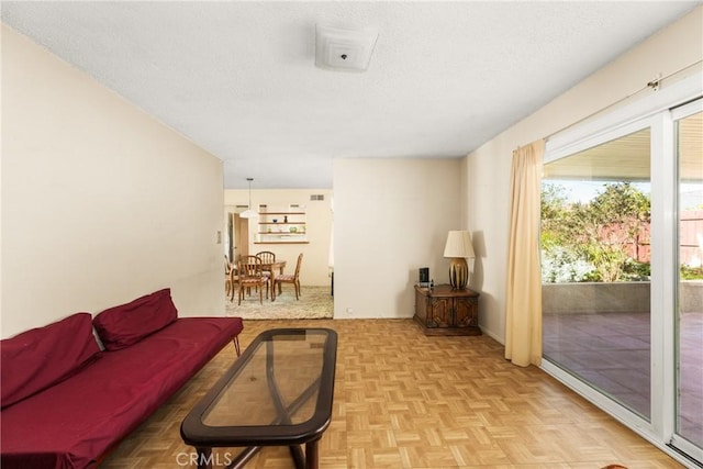 living room featuring light parquet flooring