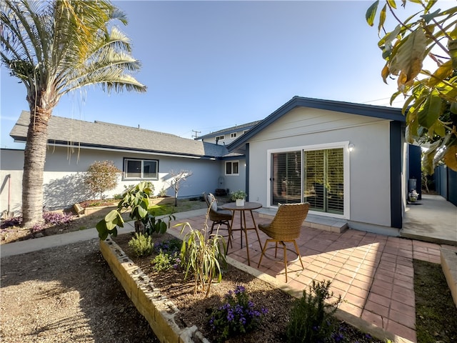 rear view of property with a patio