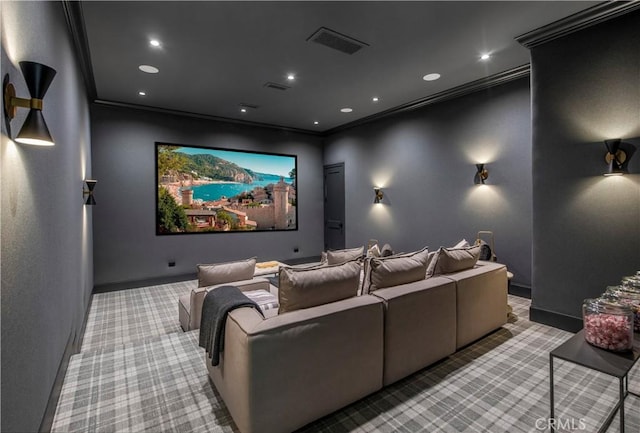 carpeted cinema with crown molding