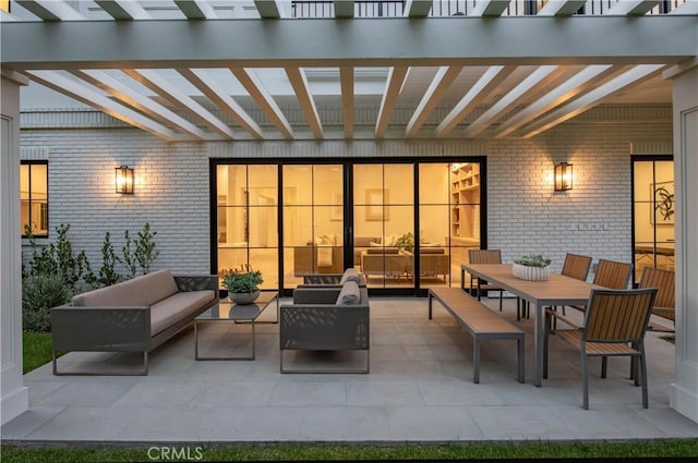 view of patio with an outdoor hangout area and a pergola