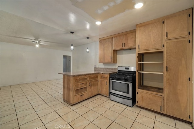 kitchen with ceiling fan, hanging light fixtures, kitchen peninsula, light brown cabinetry, and stainless steel range with gas stovetop