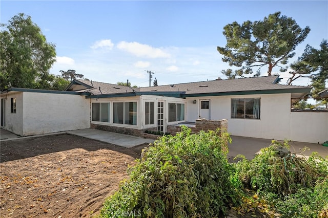 back of house featuring a patio area