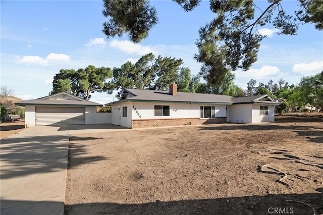 single story home with a garage