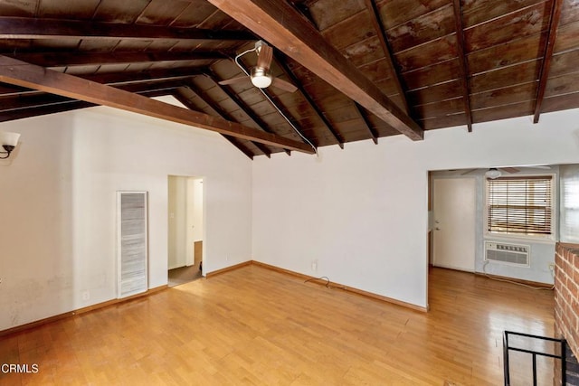 unfurnished living room featuring a wall unit AC, ceiling fan, wood ceiling, and lofted ceiling with beams