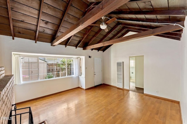 unfurnished living room featuring hardwood / wood-style flooring, wooden ceiling, and vaulted ceiling with beams