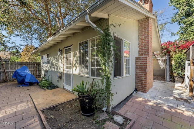 view of home's exterior featuring a patio