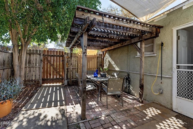 view of patio featuring a pergola