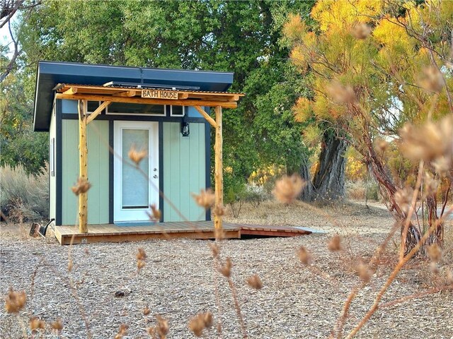 exterior space featuring a storage unit