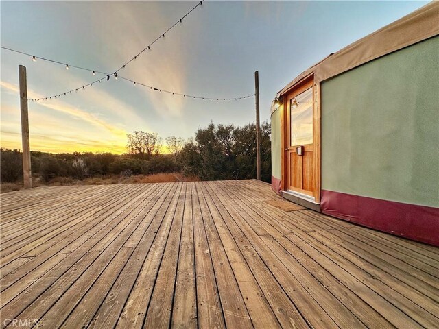 view of deck at dusk