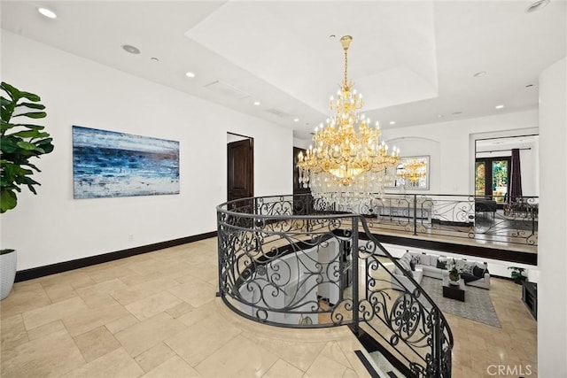 hall with french doors and an inviting chandelier