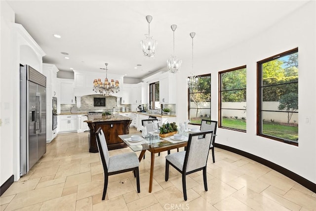 dining area featuring a chandelier