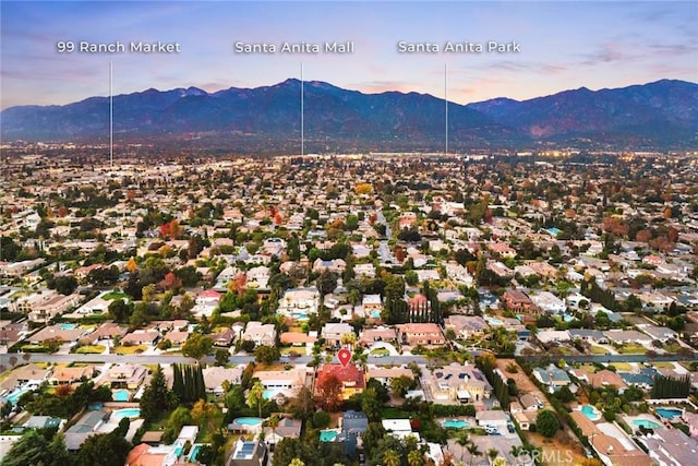 aerial view at dusk with a mountain view