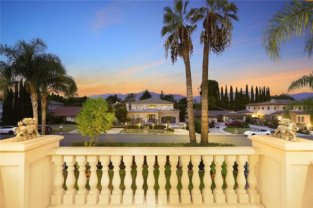 yard at dusk with a balcony