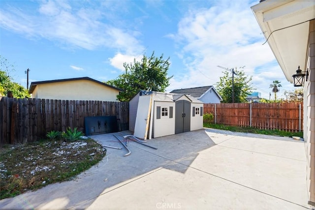 view of patio / terrace with a storage unit