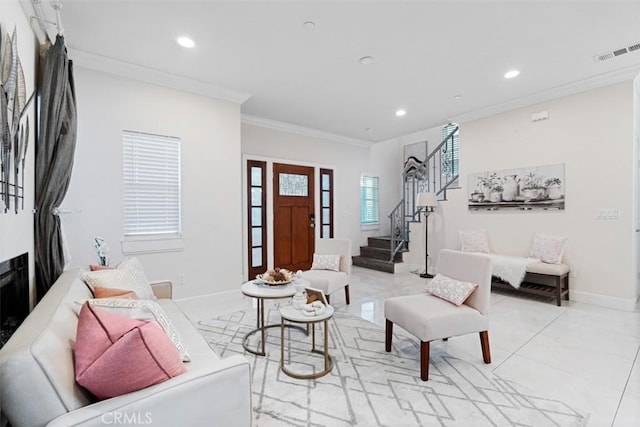 living room featuring light tile patterned flooring and ornamental molding