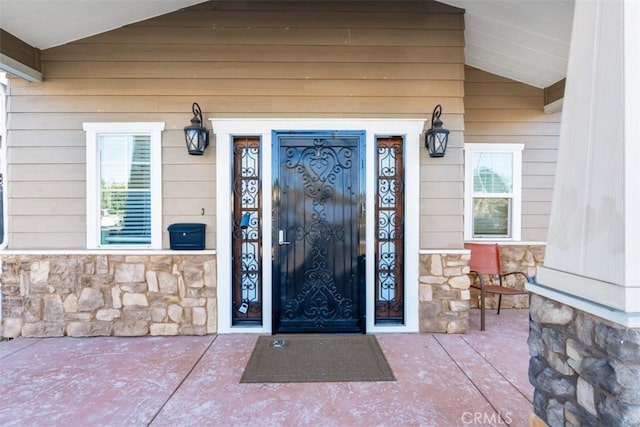 property entrance with a porch