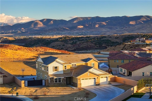 drone / aerial view featuring a mountain view