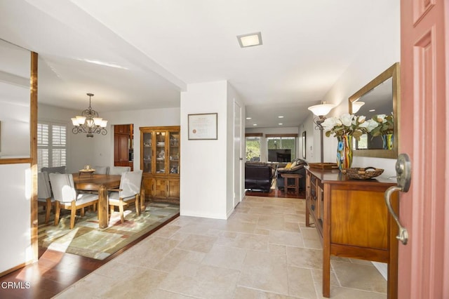 foyer with a notable chandelier