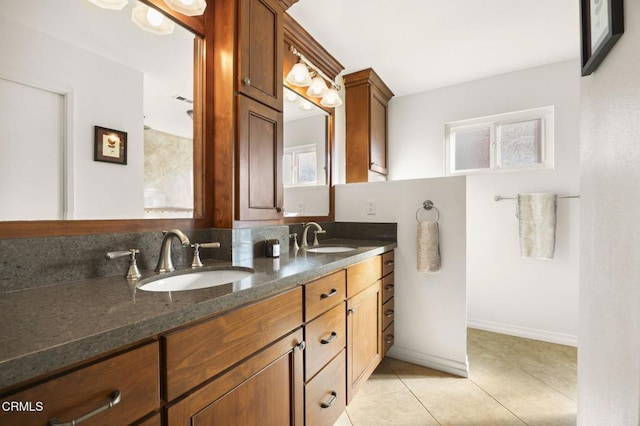 bathroom featuring vanity and tile patterned flooring