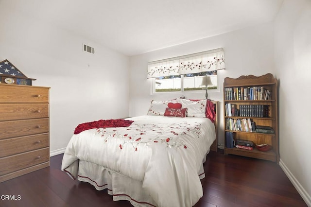 bedroom featuring dark hardwood / wood-style floors