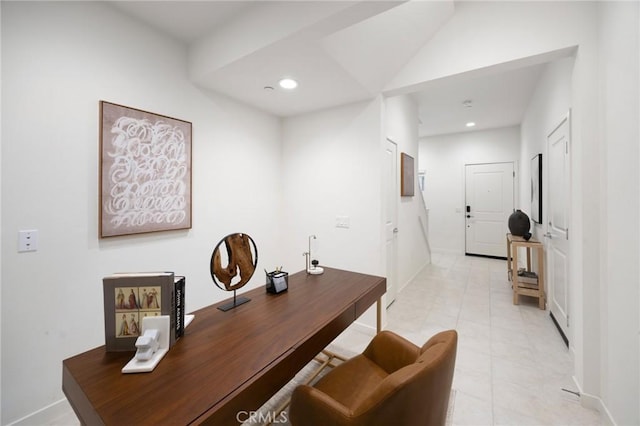 office area featuring lofted ceiling