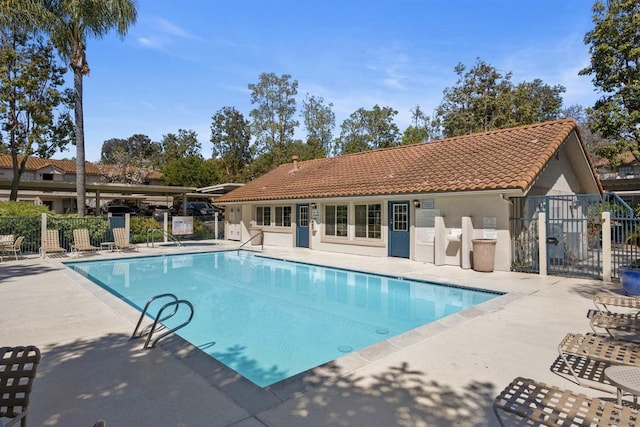 view of pool featuring a patio area