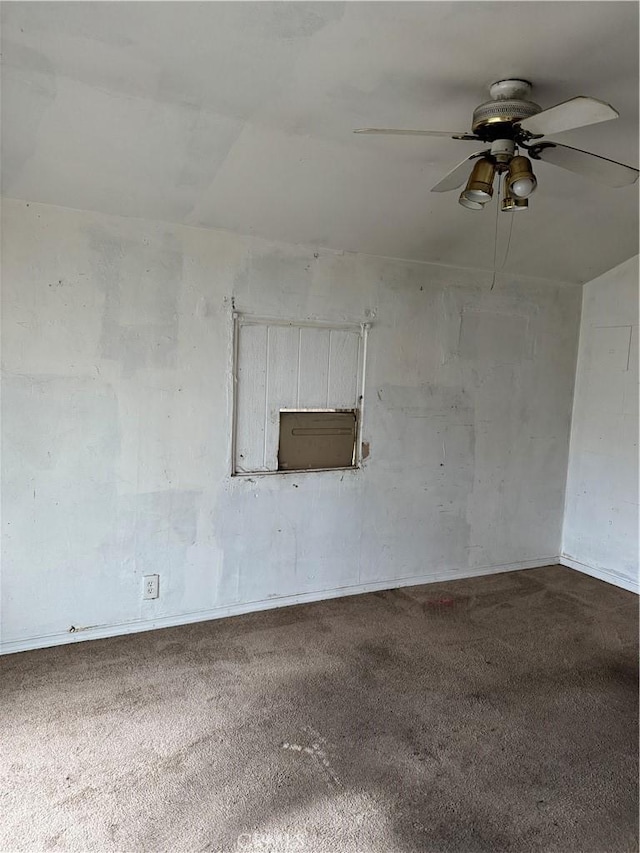 carpeted empty room with ceiling fan