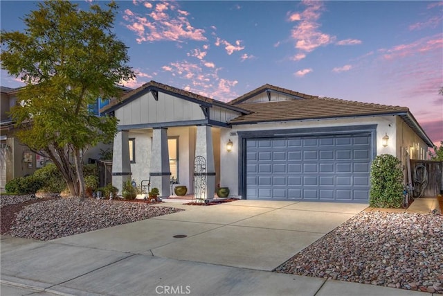 view of front of home with a garage