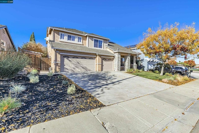 front of property featuring a garage