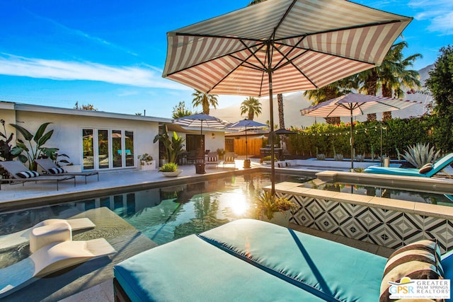 view of pool featuring a patio area