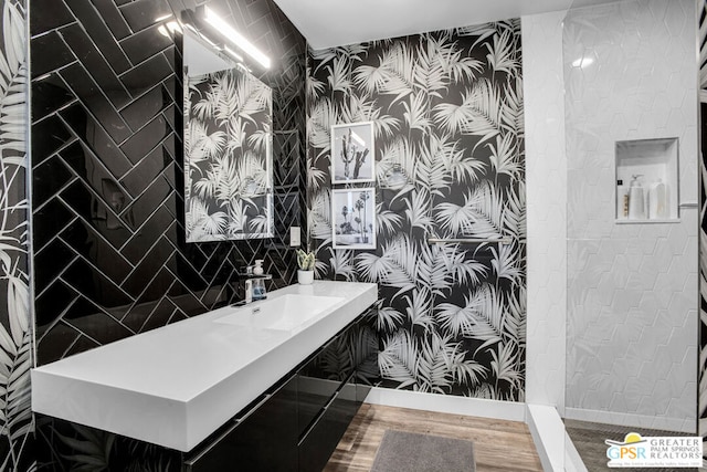 bathroom featuring hardwood / wood-style floors and sink