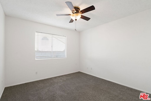 carpeted empty room featuring a textured ceiling and ceiling fan