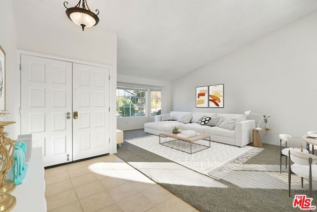 living room with light carpet and lofted ceiling